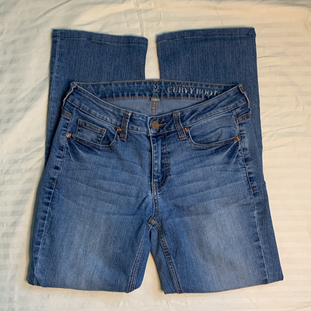 NY&C ladies 4 Curvy Bootcut sits at lower waist. Blue